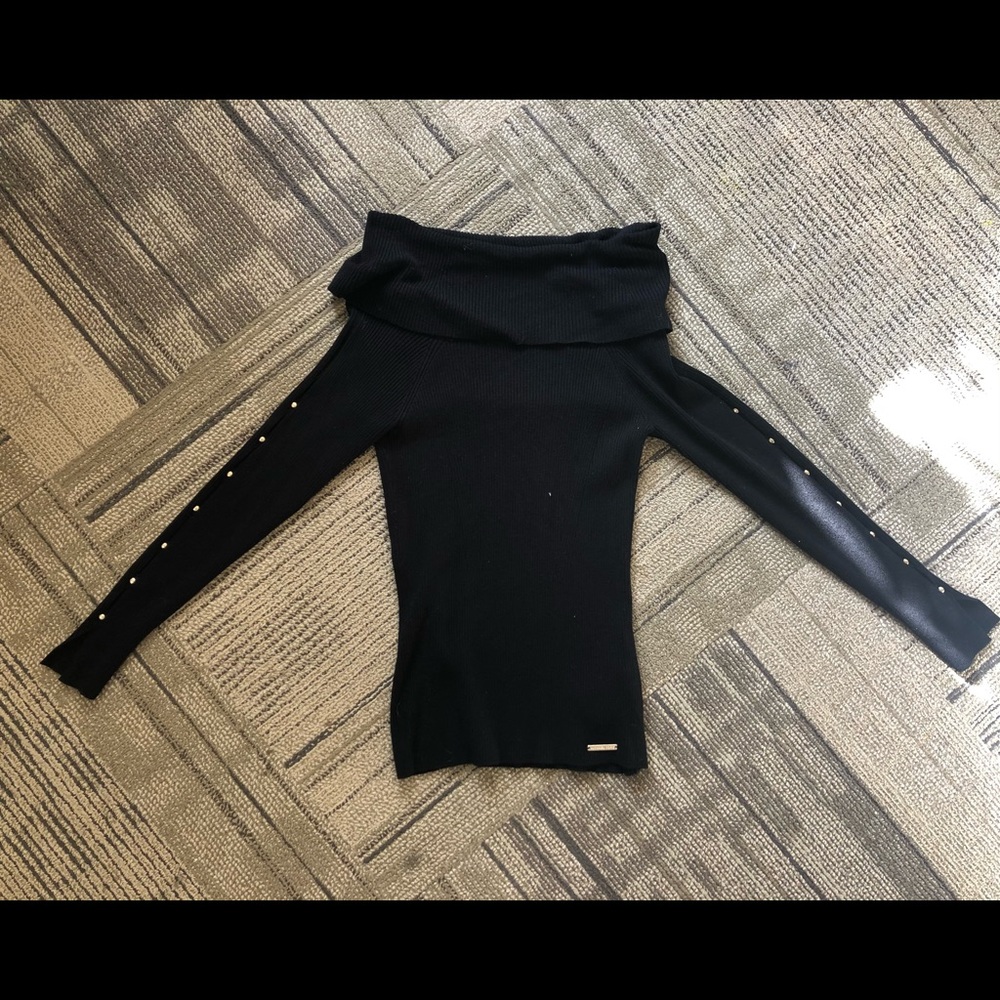 Black sweater off the shoulder
